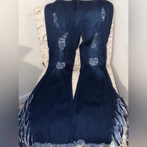 Dark blue ripped bell bottom jeans